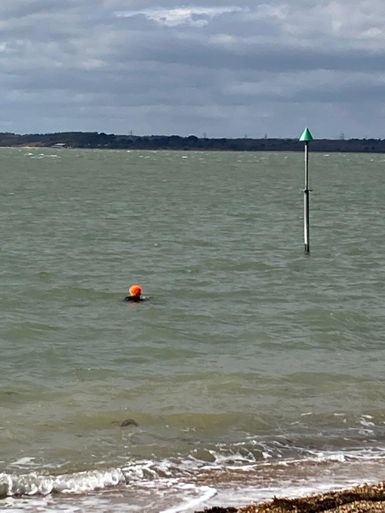 orange hat ladies, sea swimming